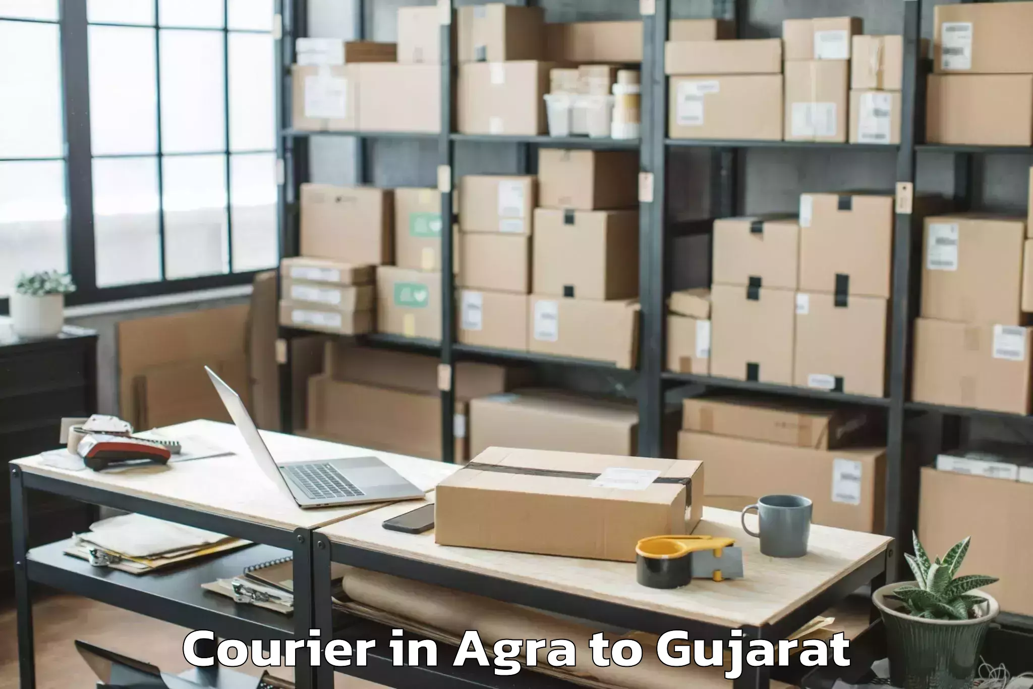 Easy Agra to Kosamba Courier Booking